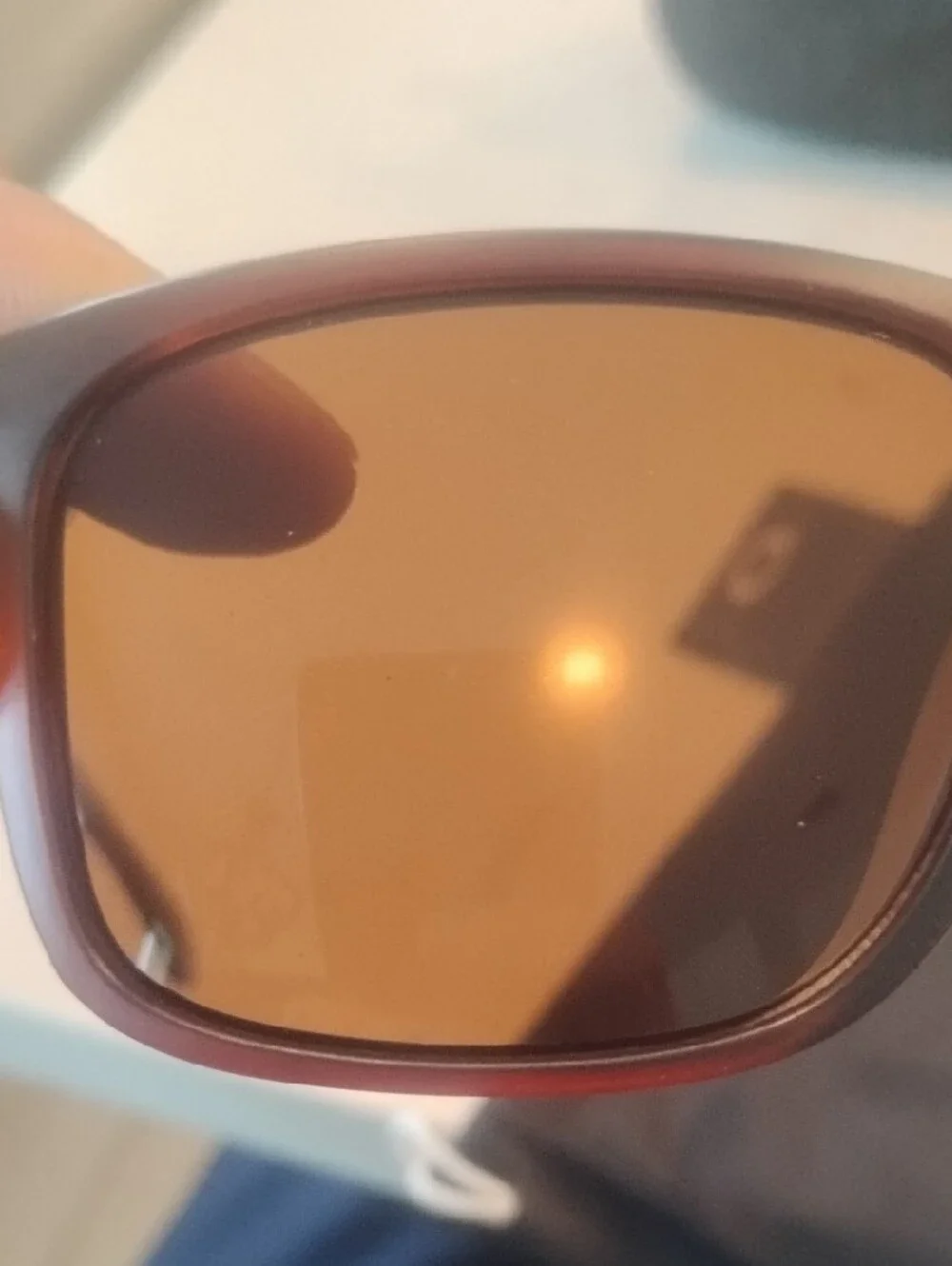 Oakley Brown Frame Sunglasses with Dark Lenses